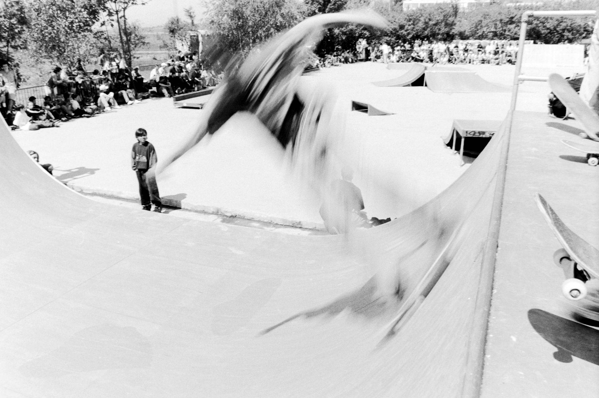 Skateboarder performing trick at outdoor event