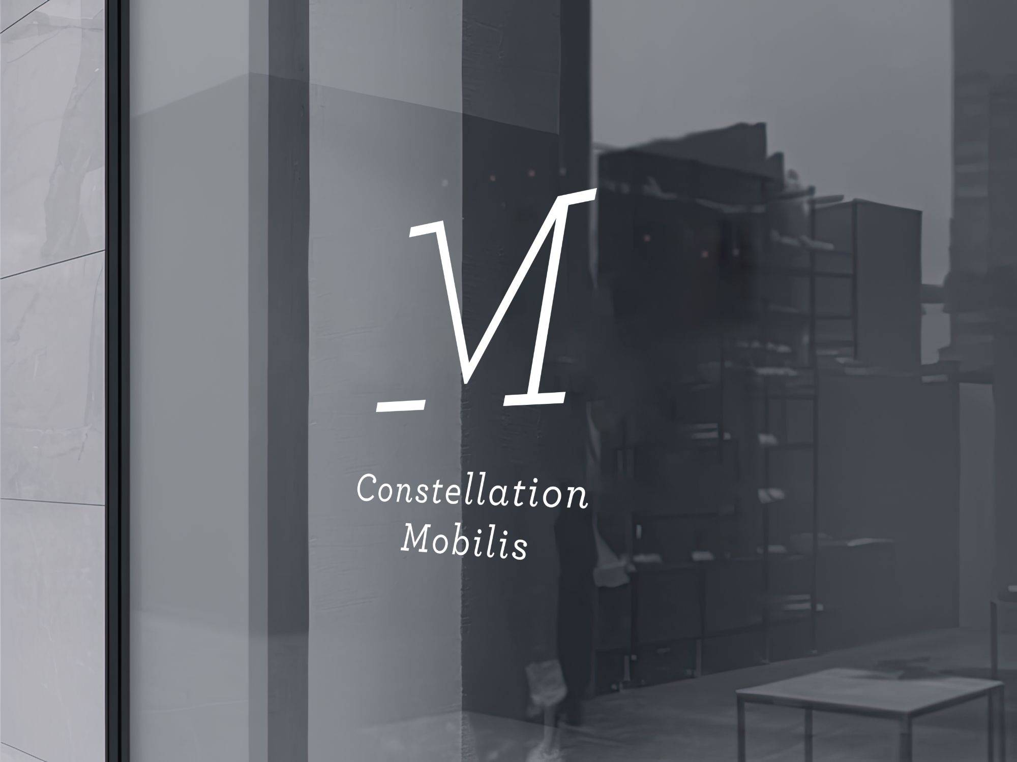 Design de logo moderne pour Constellation Mobilis sur mur vitré
